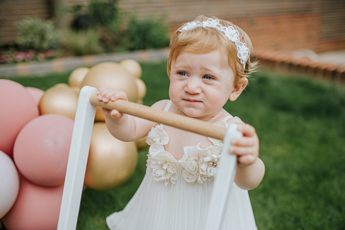  Baby Amalia photographed back garden after christening. 