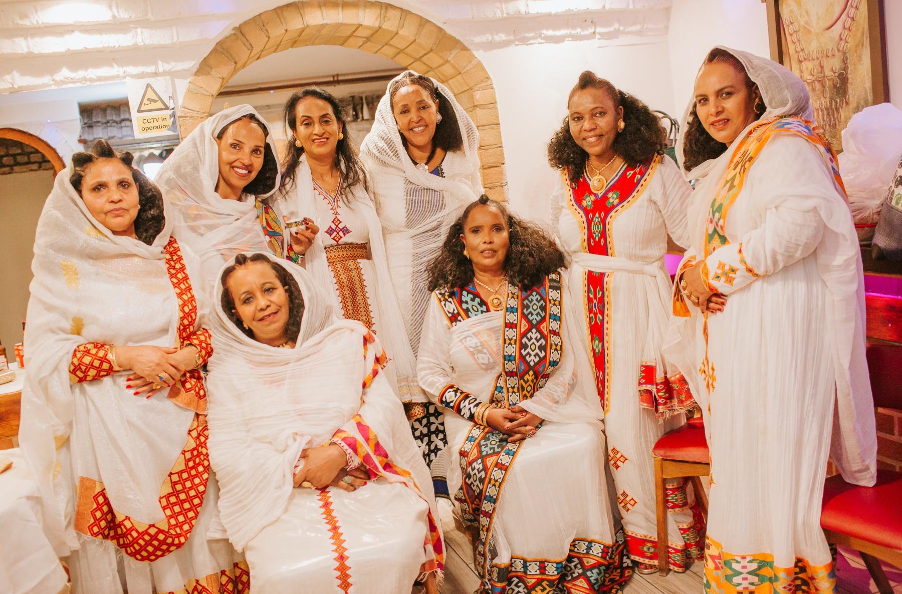 Guests of the Christening dressed in traditional Eritrean dress.