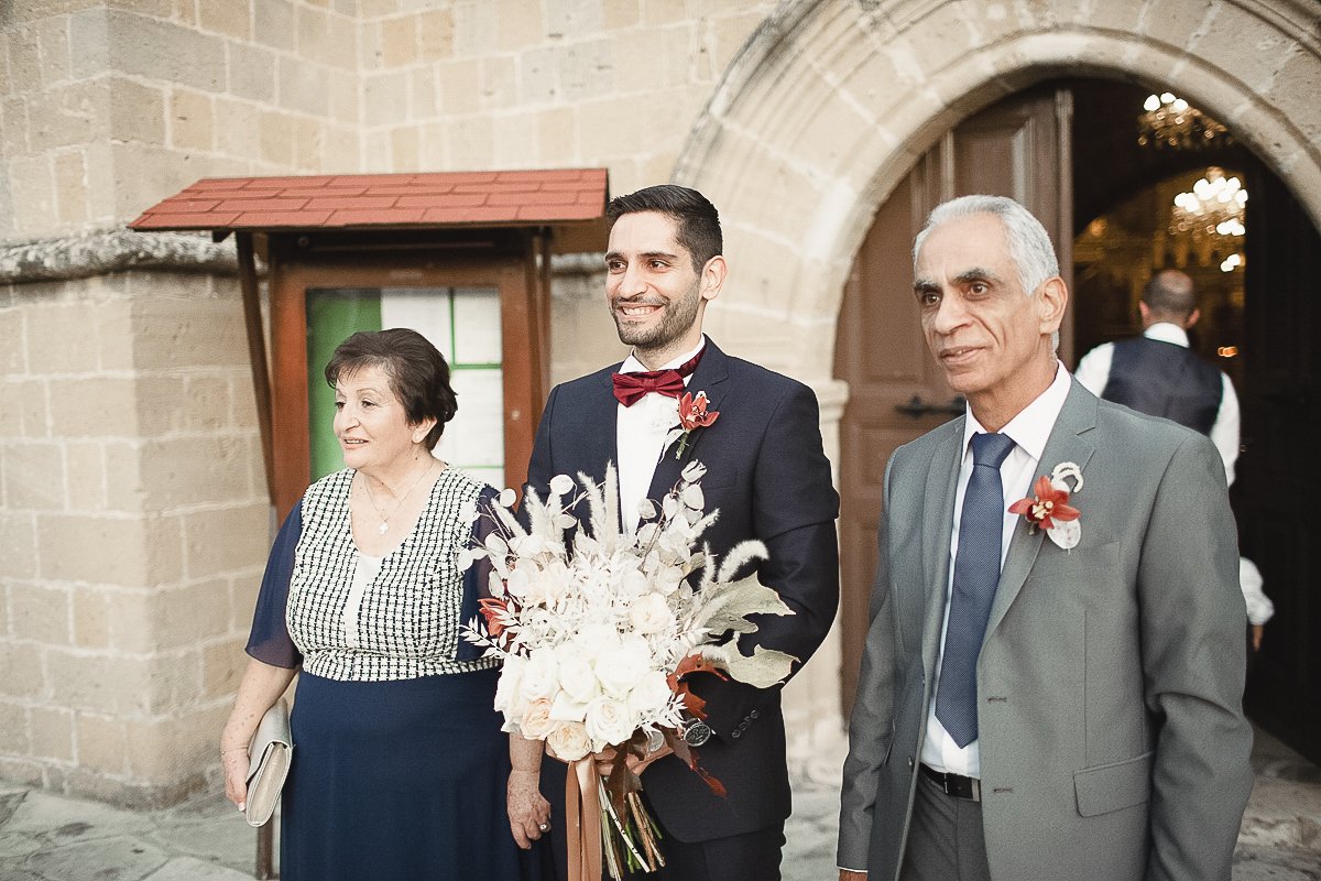 Groom waiting outside the church