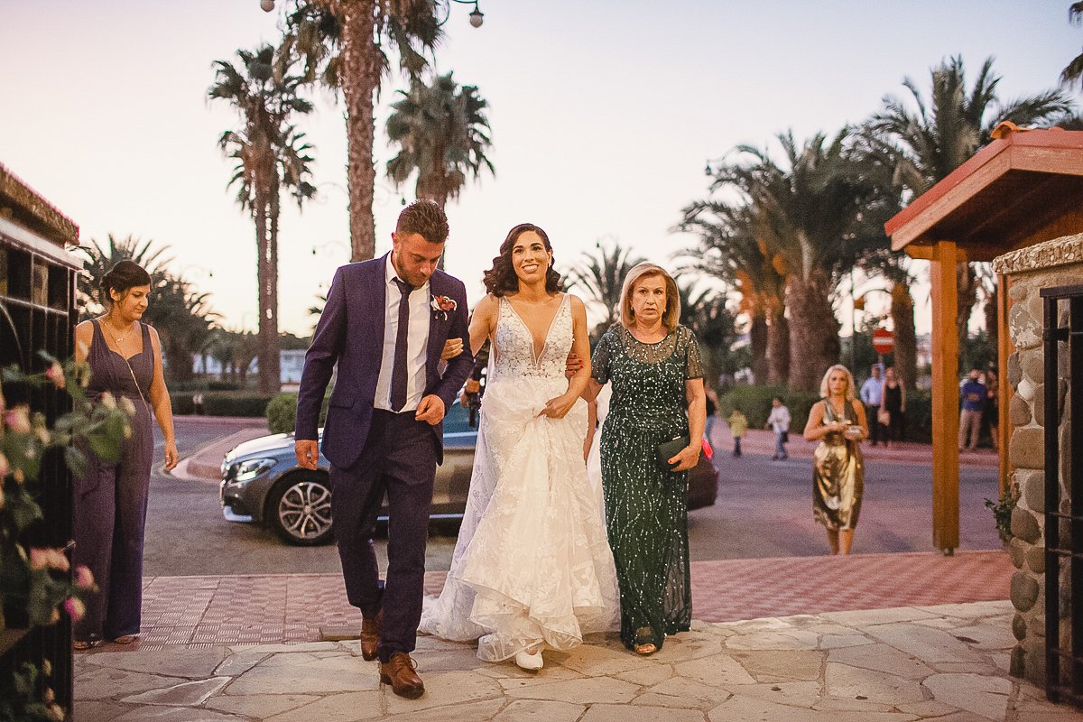 Oriana arriving at the church with her parents