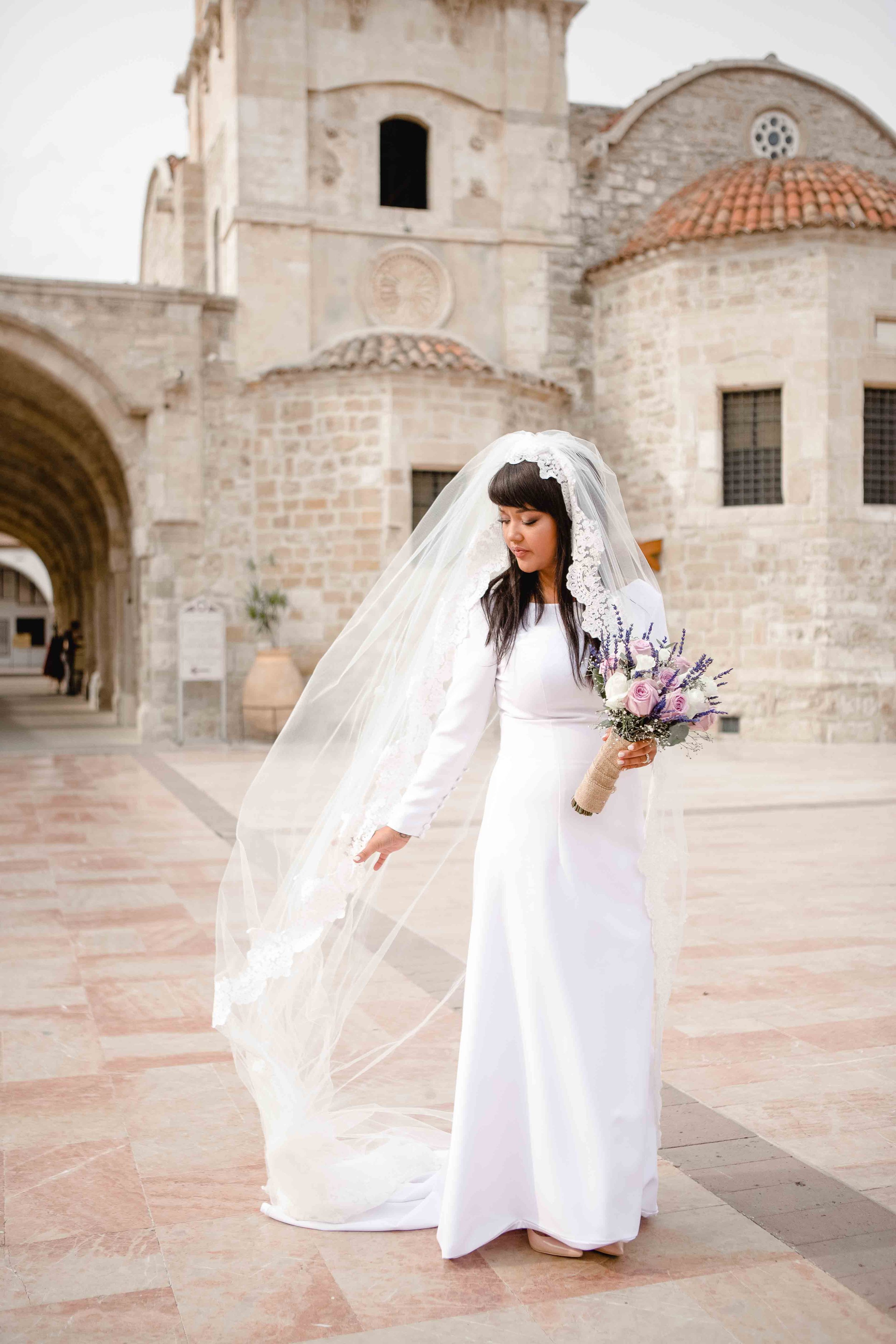 Bride Tammi posing outside St Lazarus Church, Larnaca