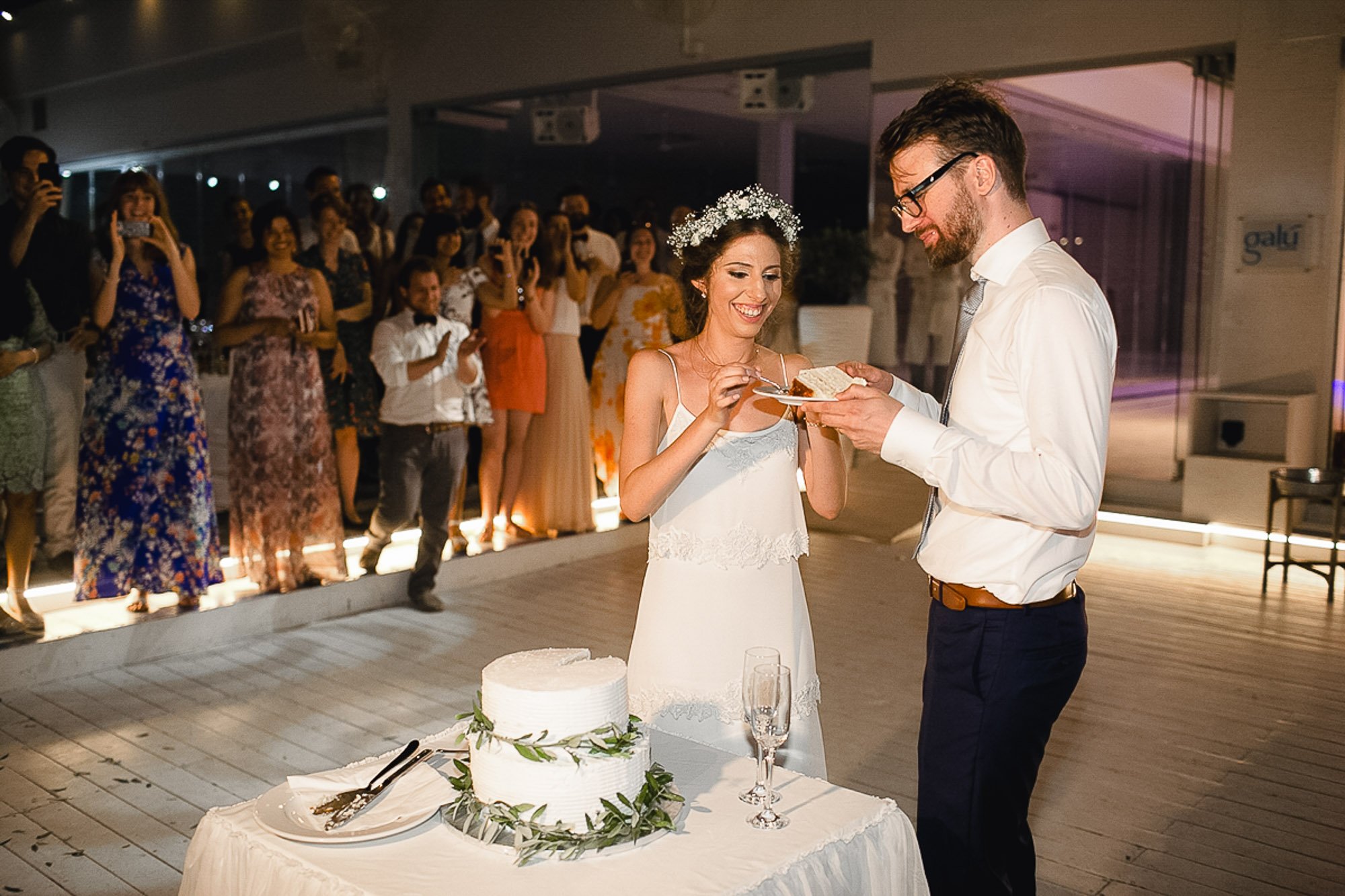 Cutting the wedding cake at Galu Seaside