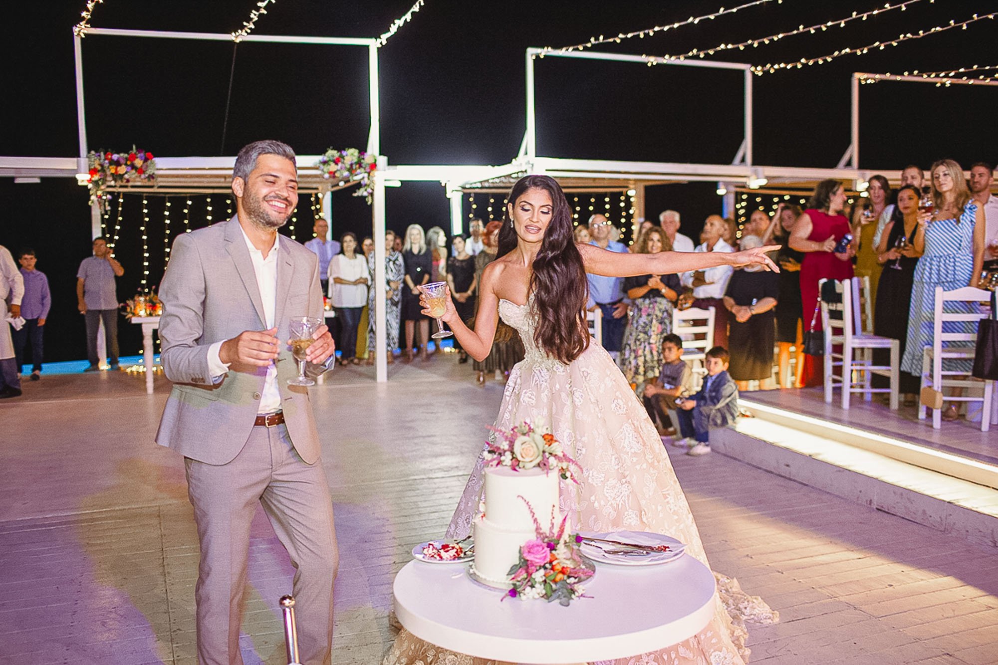 Cutting the wedding cake at Galu Seaside