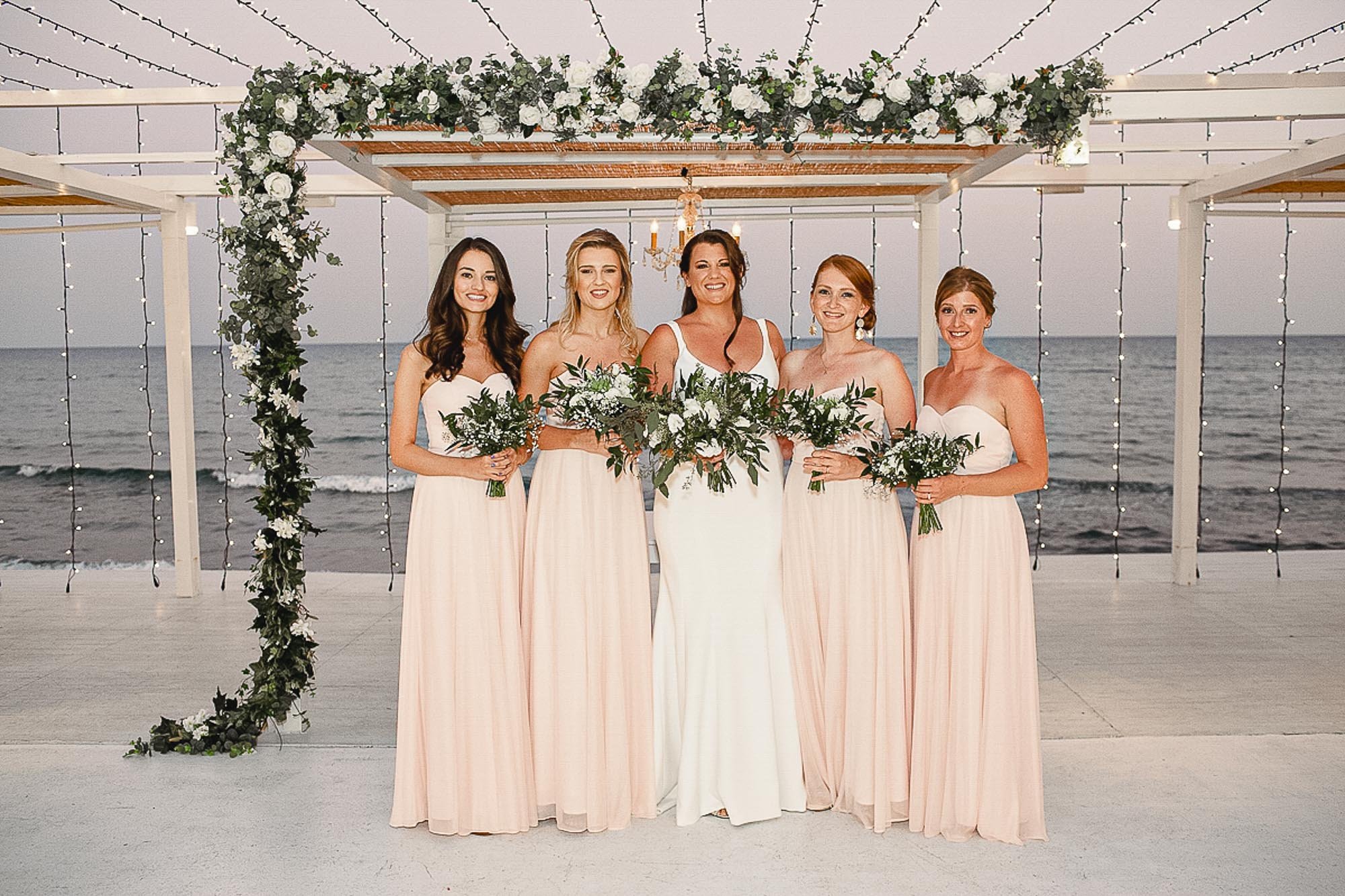 bride and bridesmaids at galu seaside