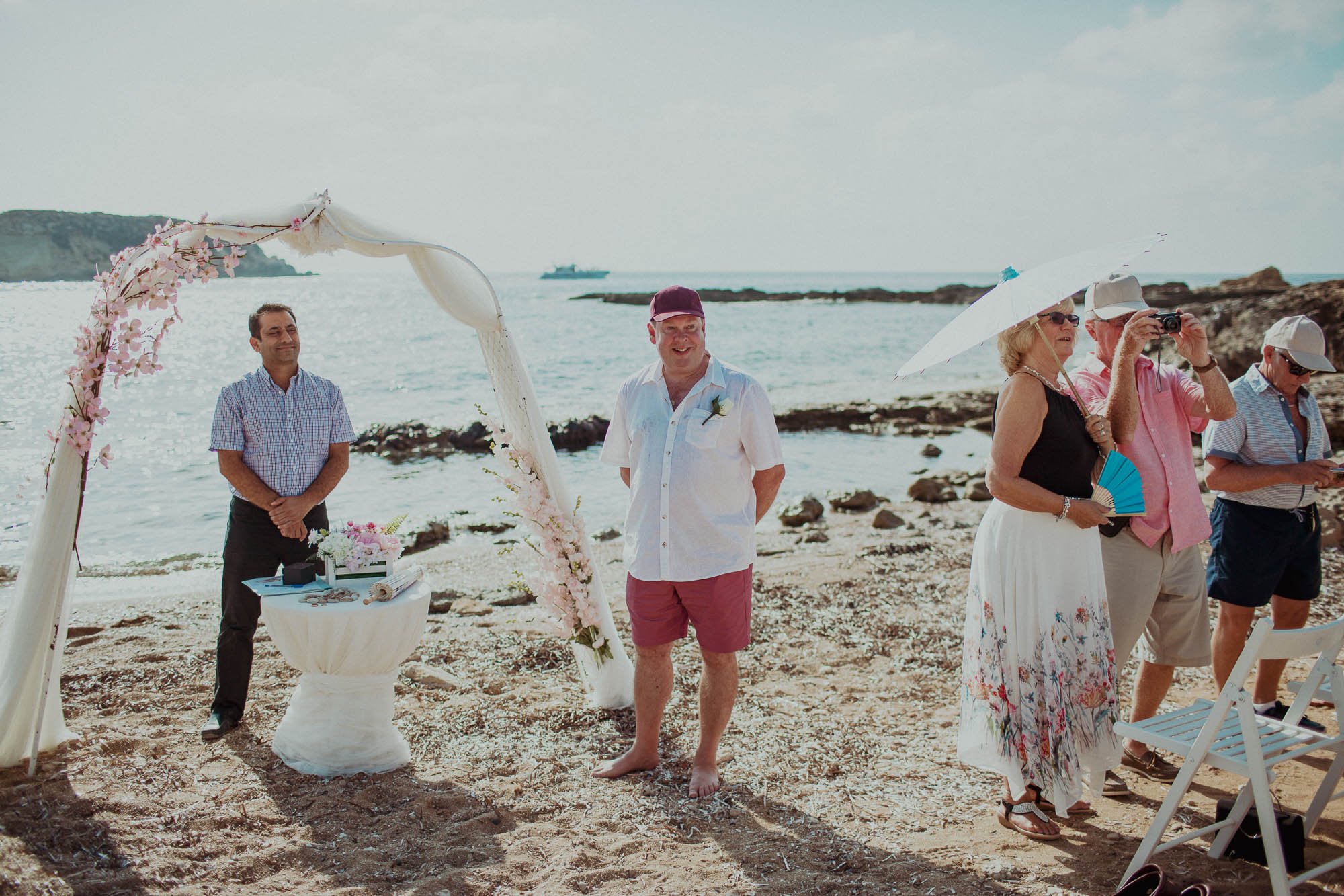 Groom waiting for bride on St Georges beach peyia paphos