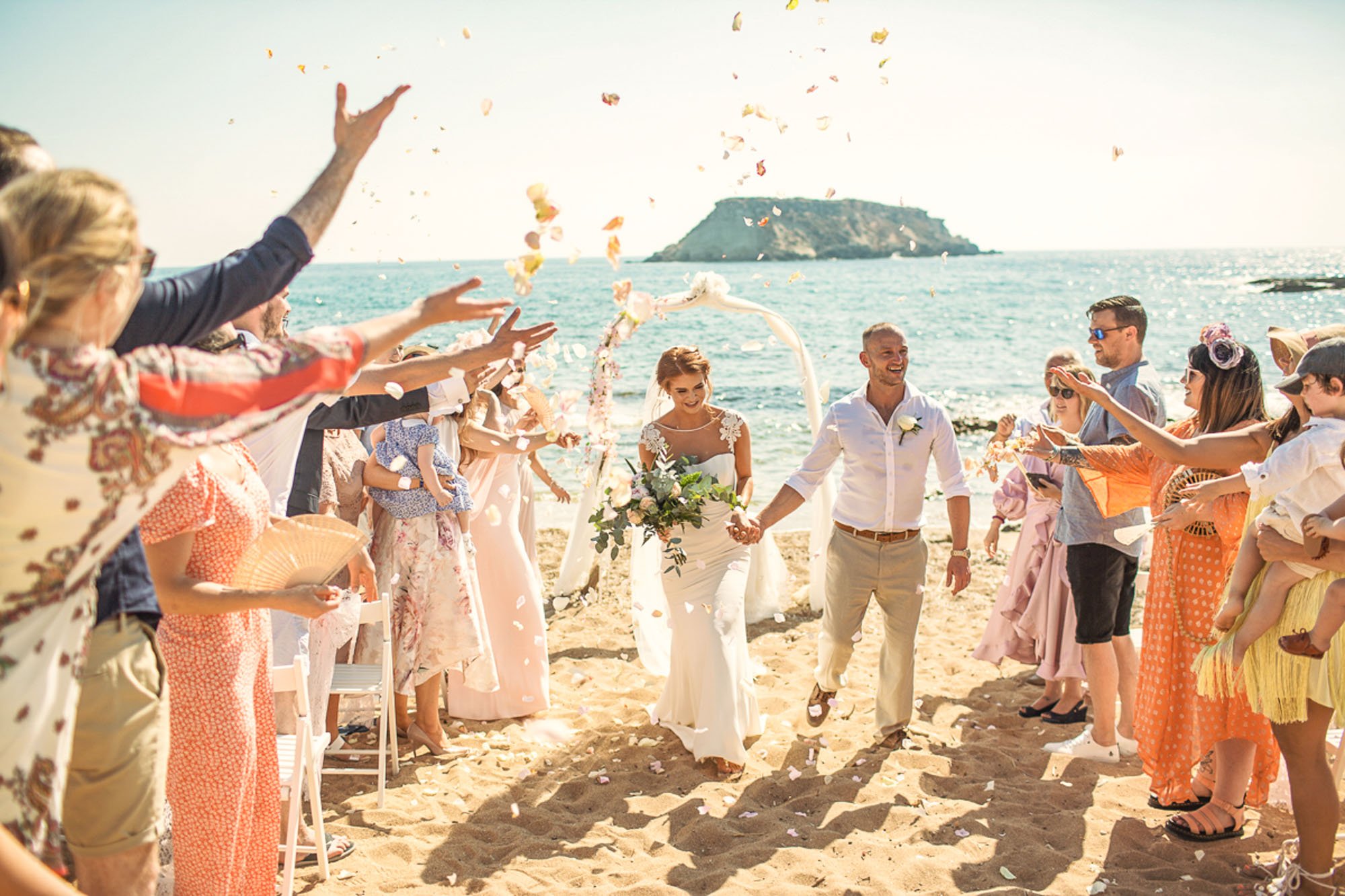 confetti shot Wedding photography at St George's Beach, Peyia, Paphos, Cyprus.