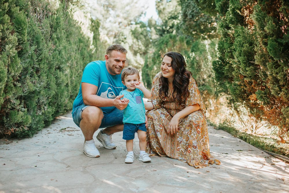 I photograph of small boy at Kykkos Park (metochi Kykkou) with his mum and dad.