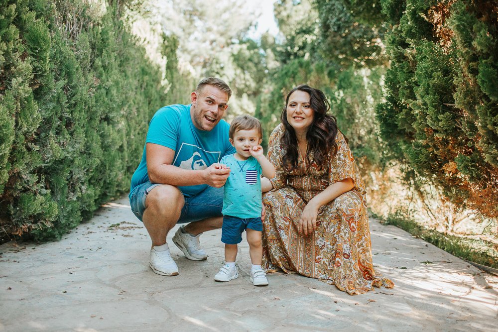 I photograph of small boy at Kykkos Park (metochi Kykkou) with his mum and dad.