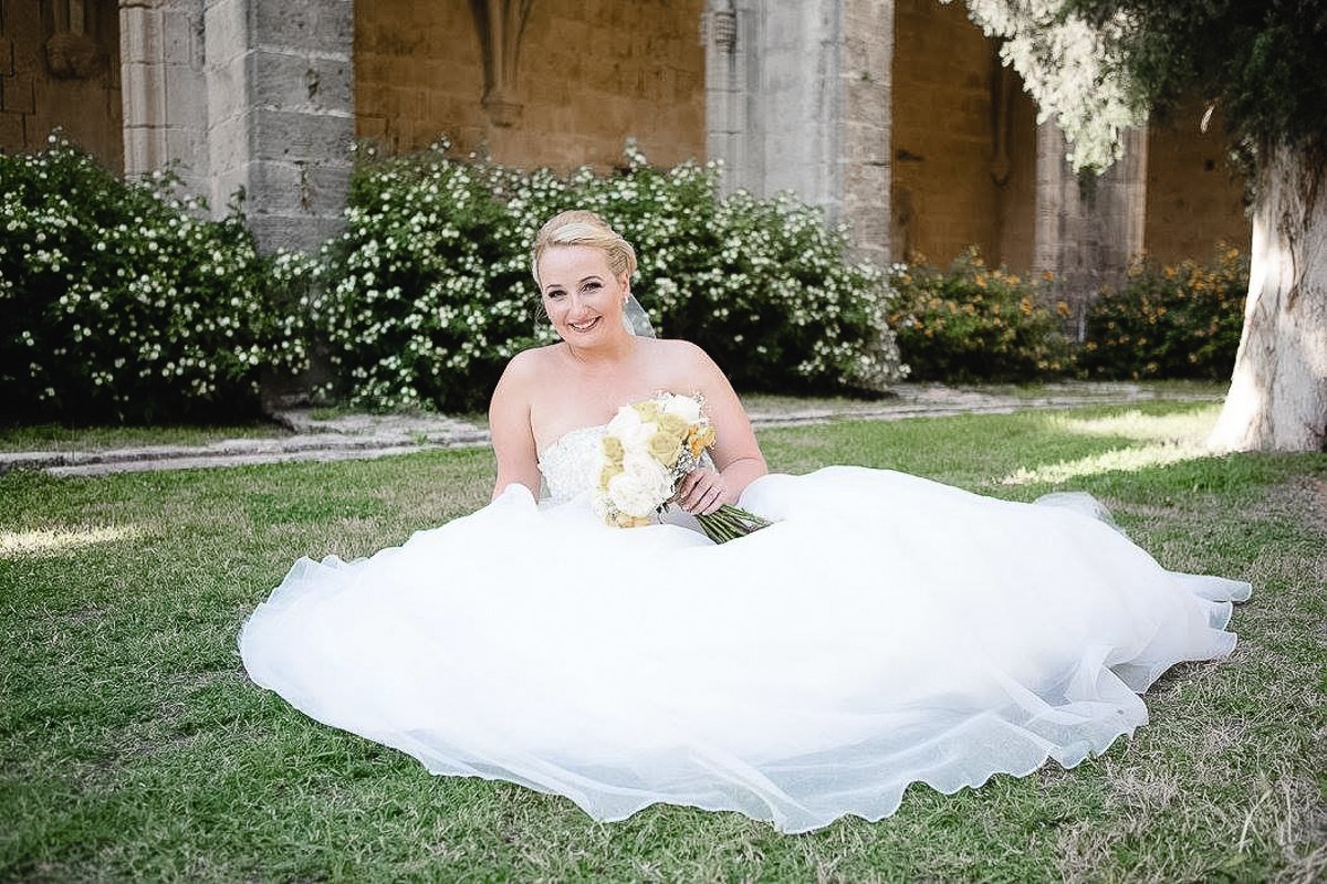  Bride posing after her wedding at Bellapais Abbey. 