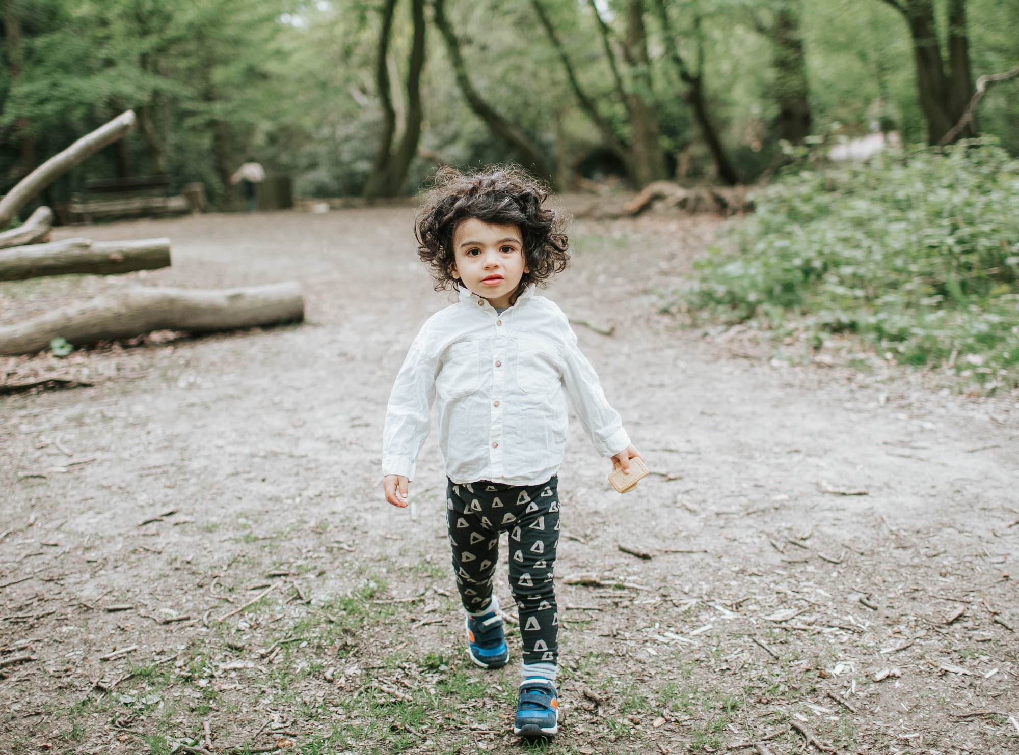 Young Theo walking along in Highgate Woods.