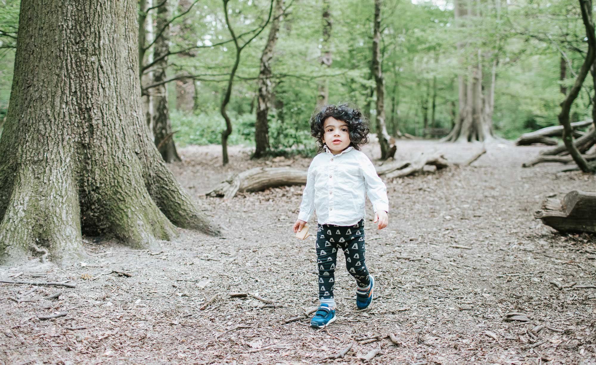 Young Theo walking along in Highgate Woods.