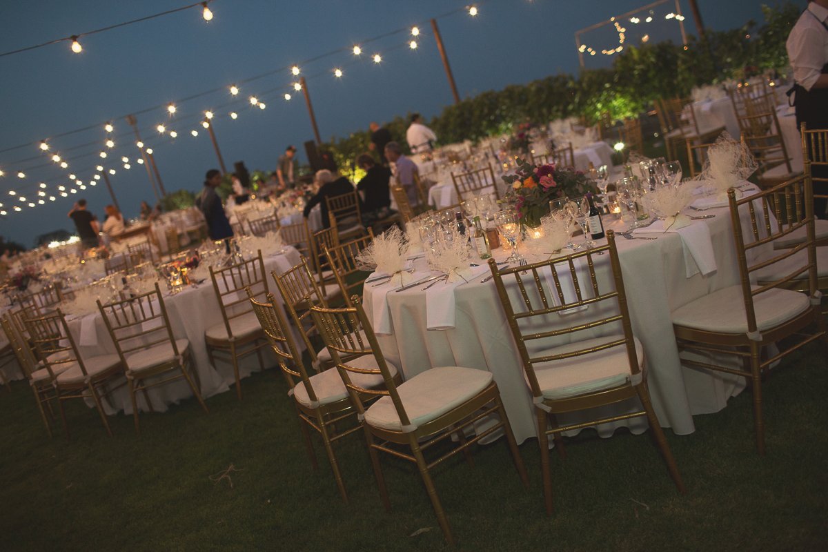 Nightime and Wedding tables at Aes Ambelis winery.