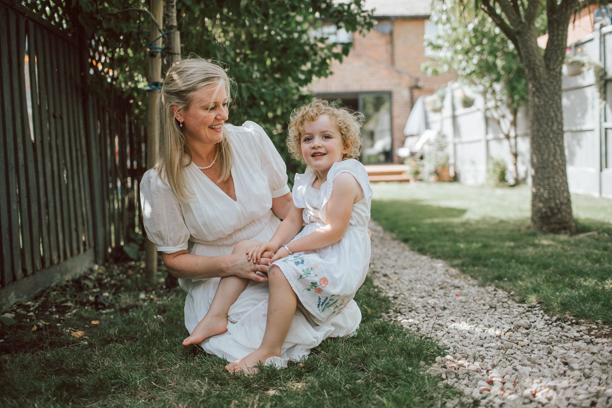 Jot-Anne and her daughter sitting in their garden in Tooting, south London