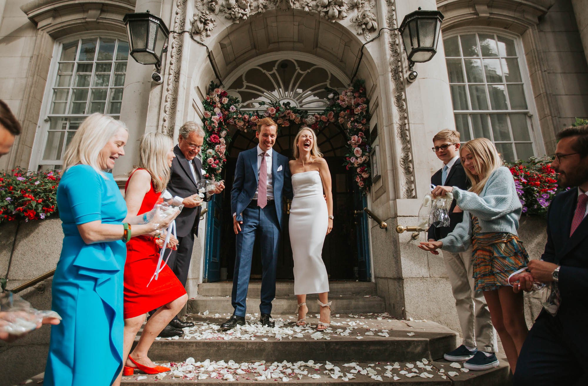  Newly married Kelly and Fin get showered with confetti from their friends and family on the steps outside Chelsea Old Town Hall. 