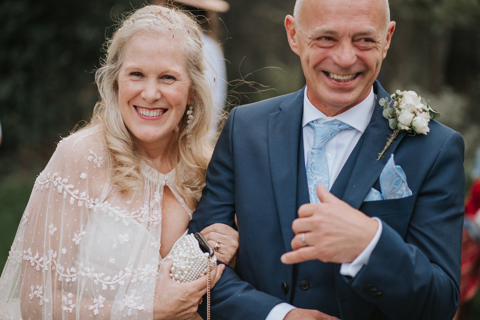  Bride and groom smiling after their wedding at Winchester House in Putney, South London. 