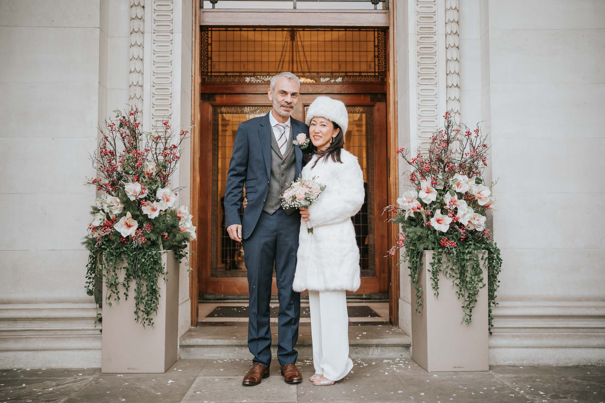  Bride and Groom having their wedding photography outside Marylebone Old Town Hall. 