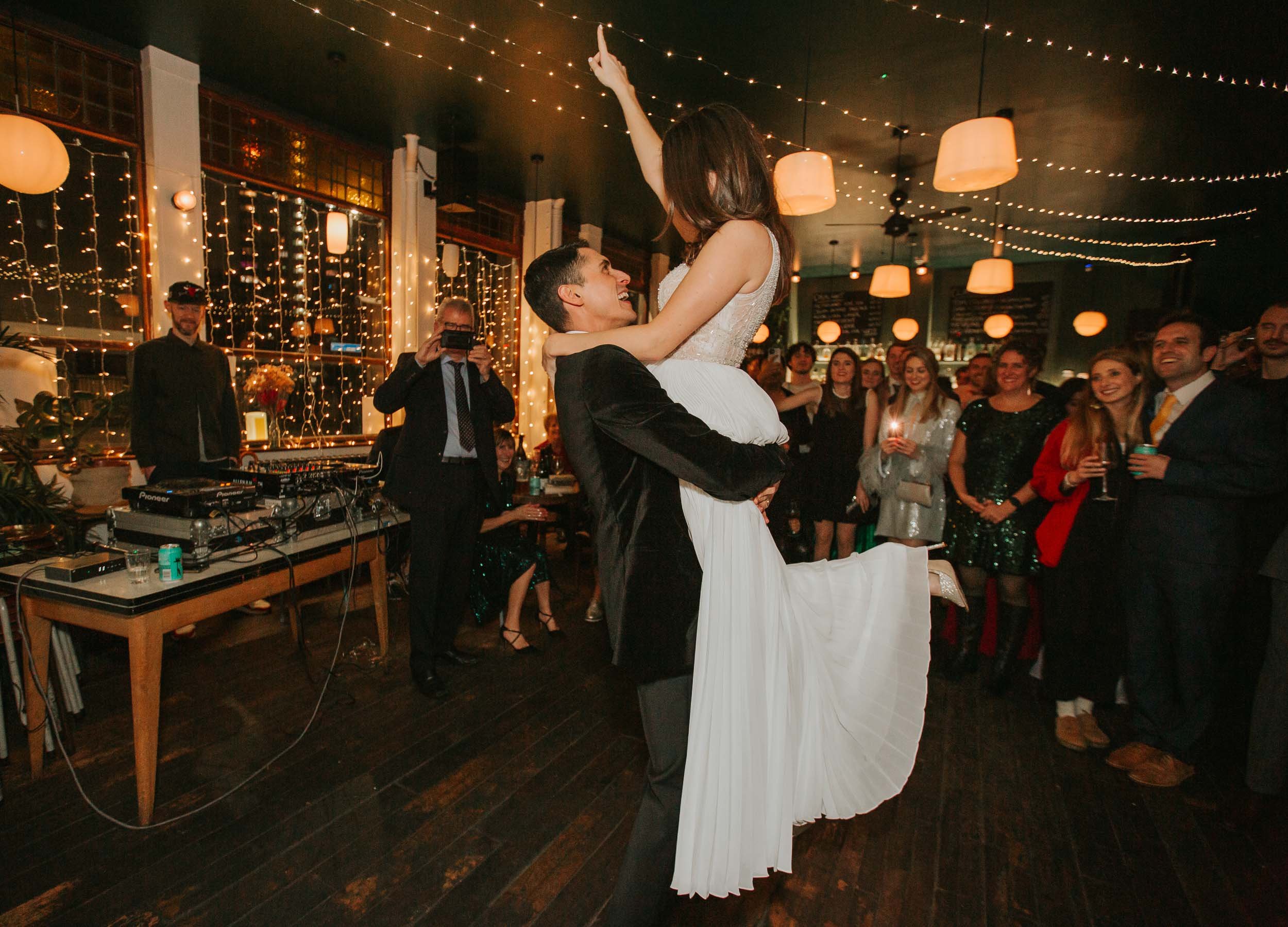  First dance of bride and groom at wedding venue Coin Laundry, Exmouth Market. 