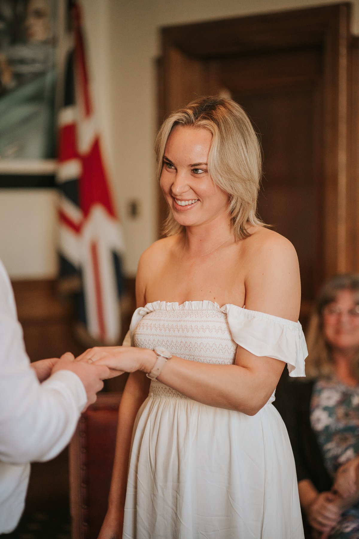  Steven and Sarah look at each other while exchanging vows at their wedding at The Elizabeth Room at Wandsworth Town Hall Registry Office. 