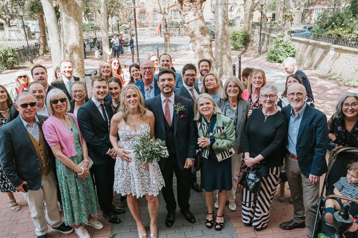  Wedding party group shot in front of Southwark Register Office. 