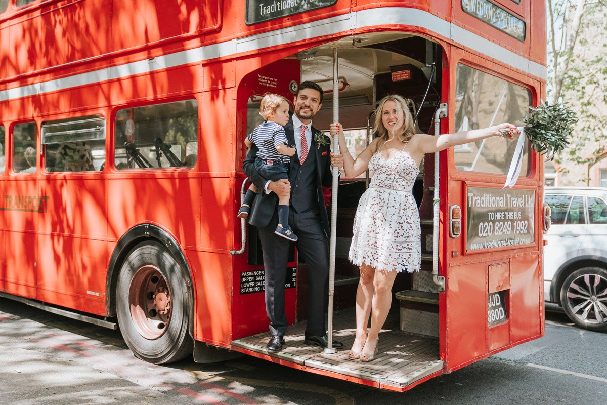  Bride and Groom getting on a wedding routemaster bus outside Southwark Register Office. 