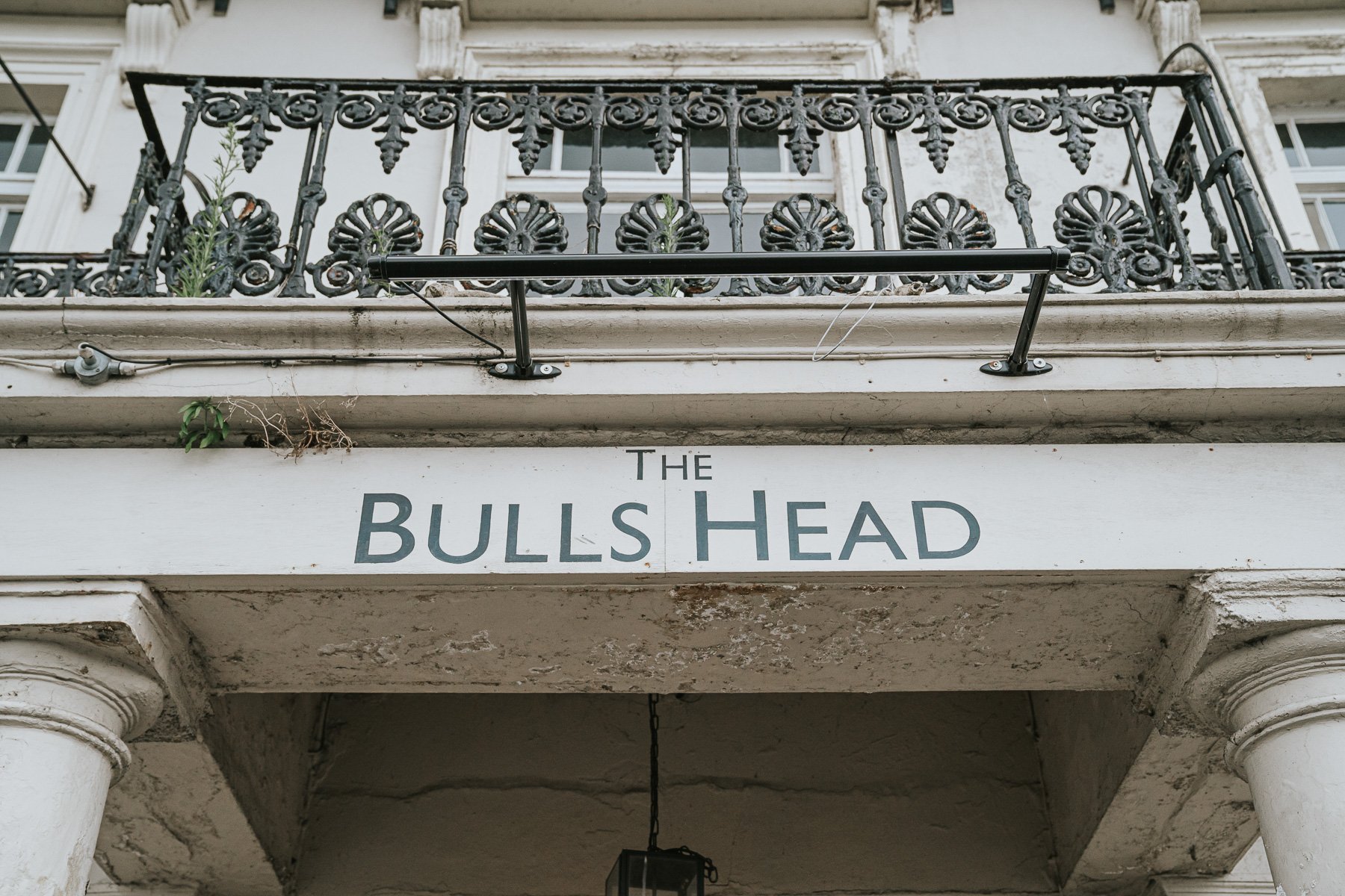  The Bulls Head Pub sign above the door of the pub. 