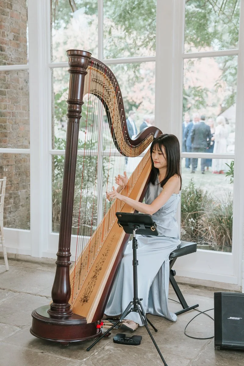 Harpist performing at a Holland Park wedding