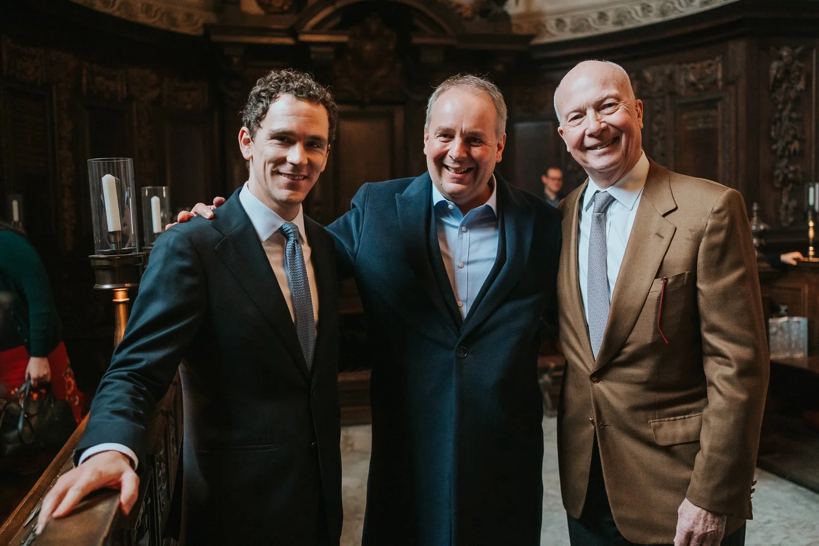  Group of male guests photographed together inside the Chapel of the Order of St Michael and St George at St Paul’s Cathedral after a christening 