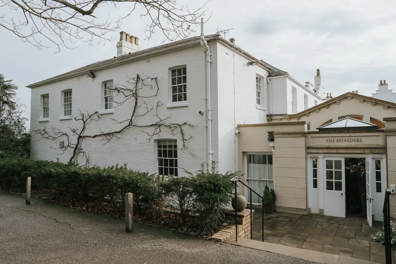  Exterior of Pembroke Lodge and the Belvedere Suite entrance in Richmond Park, popular South West London wedding venue. 
