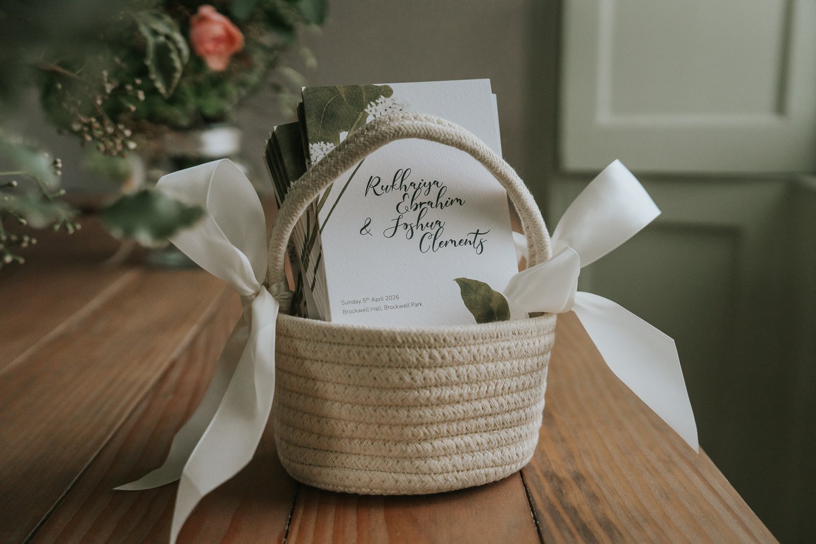  Wedding order of service basket with printed ceremony programmes at Brockwell Hall, South London civil ceremony details. 