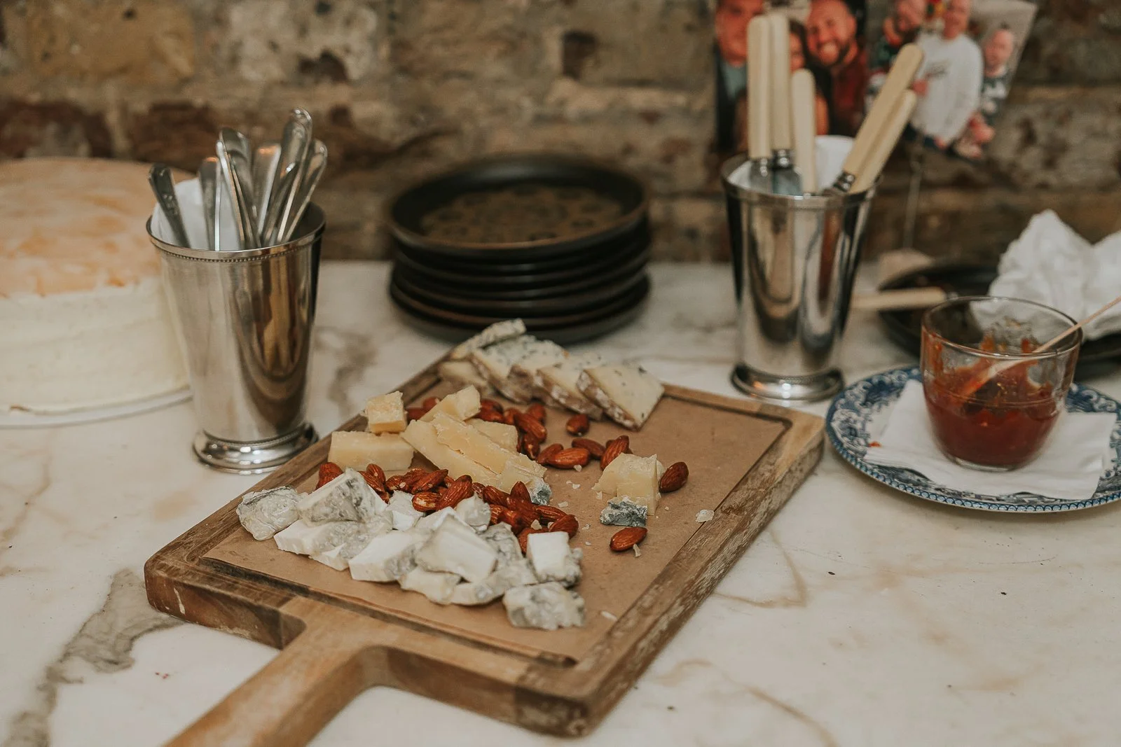  Cheese board and party food details at a 40th birthday celebration, photographed as part of a natural event photography gallery. 