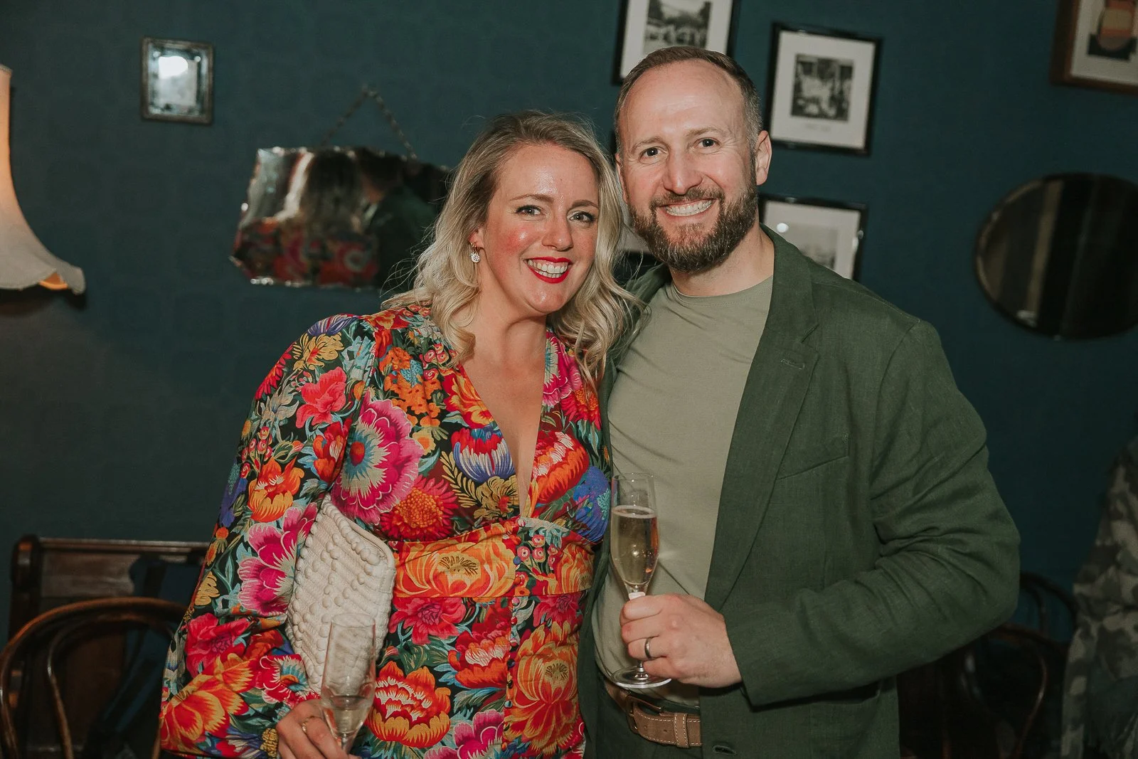  Birthday guest posing with the host during a relaxed 40th birthday celebration, captured by a London party photographer. 