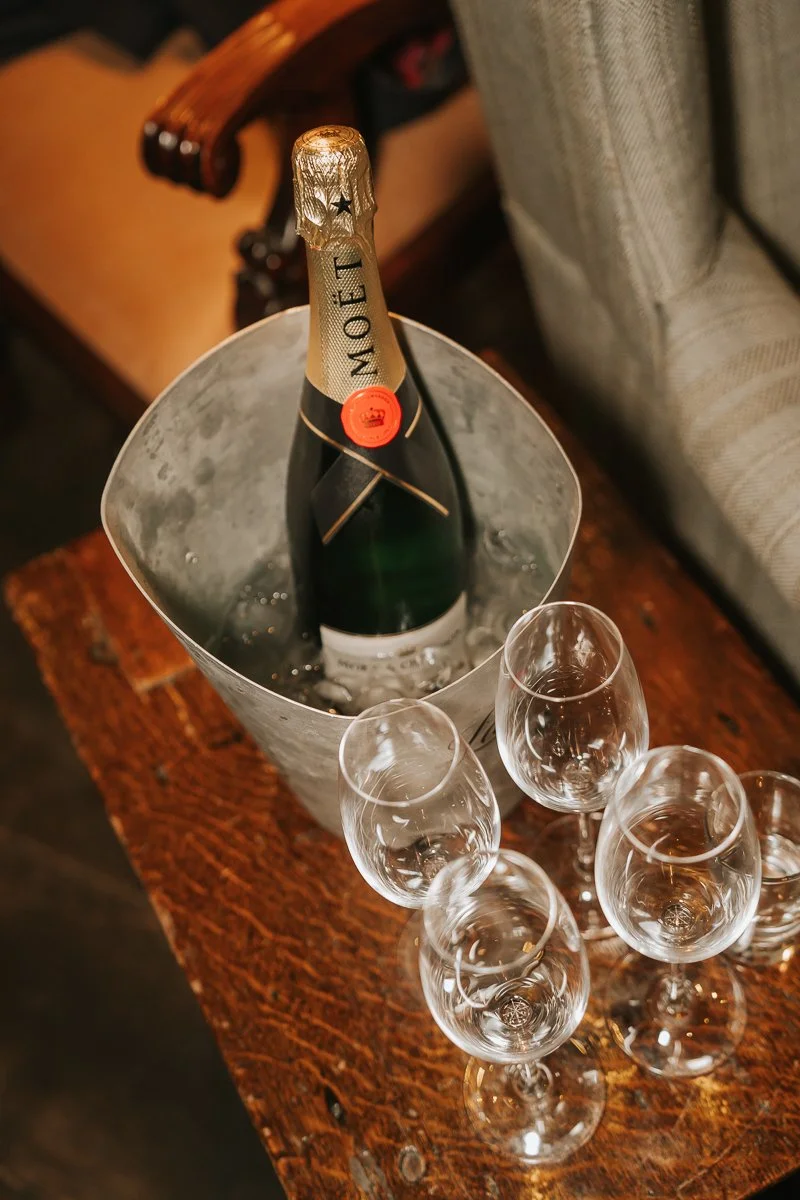  Chilled bottle of Moët &amp; Chandon champagne served at a wedding reception at The Zetter Townhouse Clerkenwell, ready for a celebratory toast. 