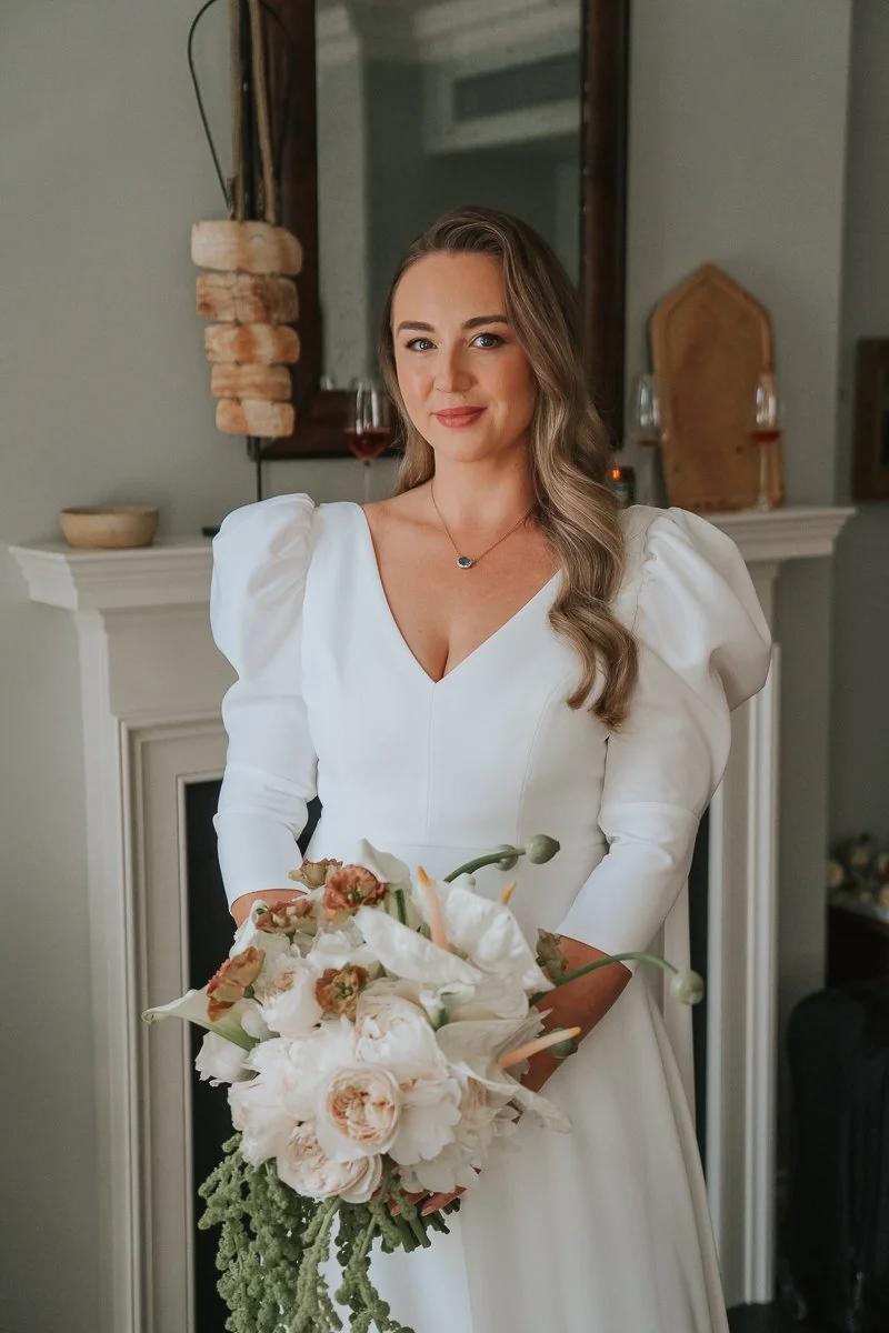  Elegant bridal portrait with cascading bouquet photographed inside The Zetter Townhouse Clerkenwell during wedding preparations. 