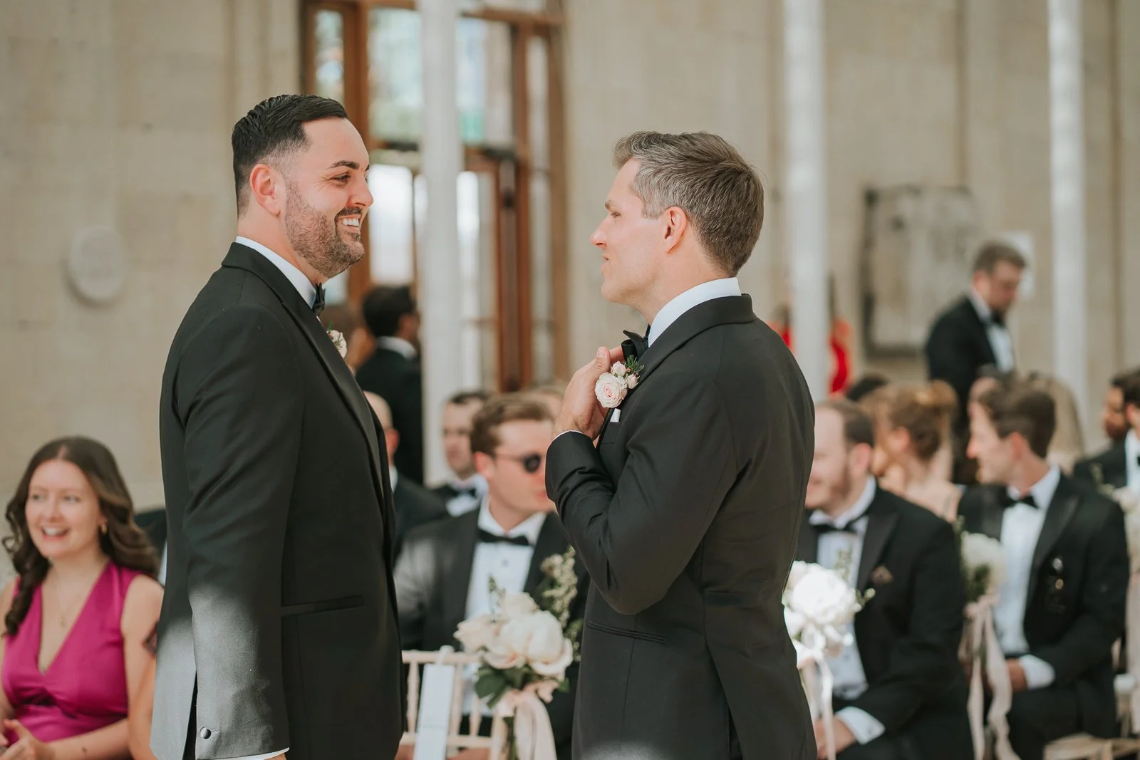 Groom sharing a smile with his best man inside the Nash Conservatory, moments before the wedding ceremony at Kew Gardens. 