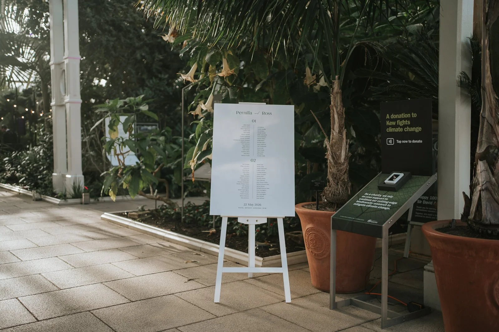  Wedding seating plan displayed amongst exotic plants inside the Temperate House at Kew Gardens before the evening reception begins. 