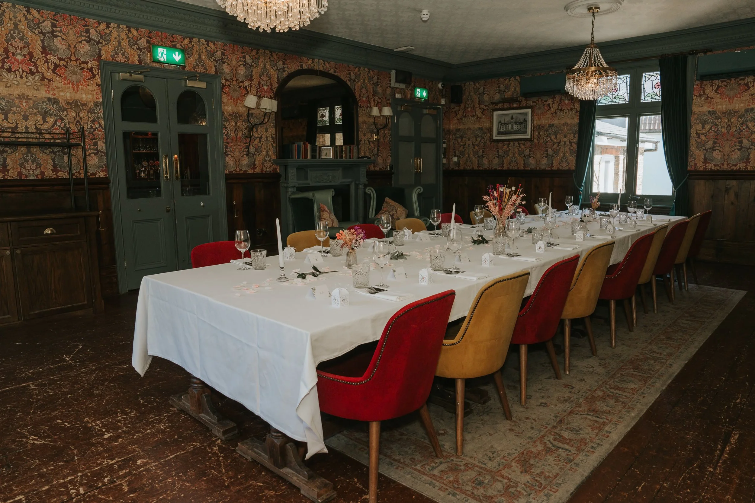  Wide view of the Trinity Room at the County Arms, prepared for a relaxed pub wedding reception in Wandsworth. 