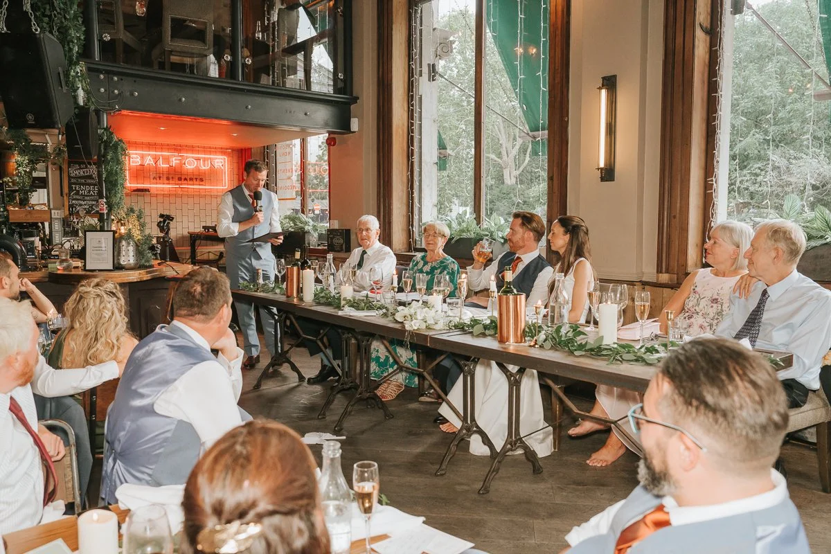   Wedding speech at the top table during a relaxed reception at Balfour St Barts in Smithfield.  