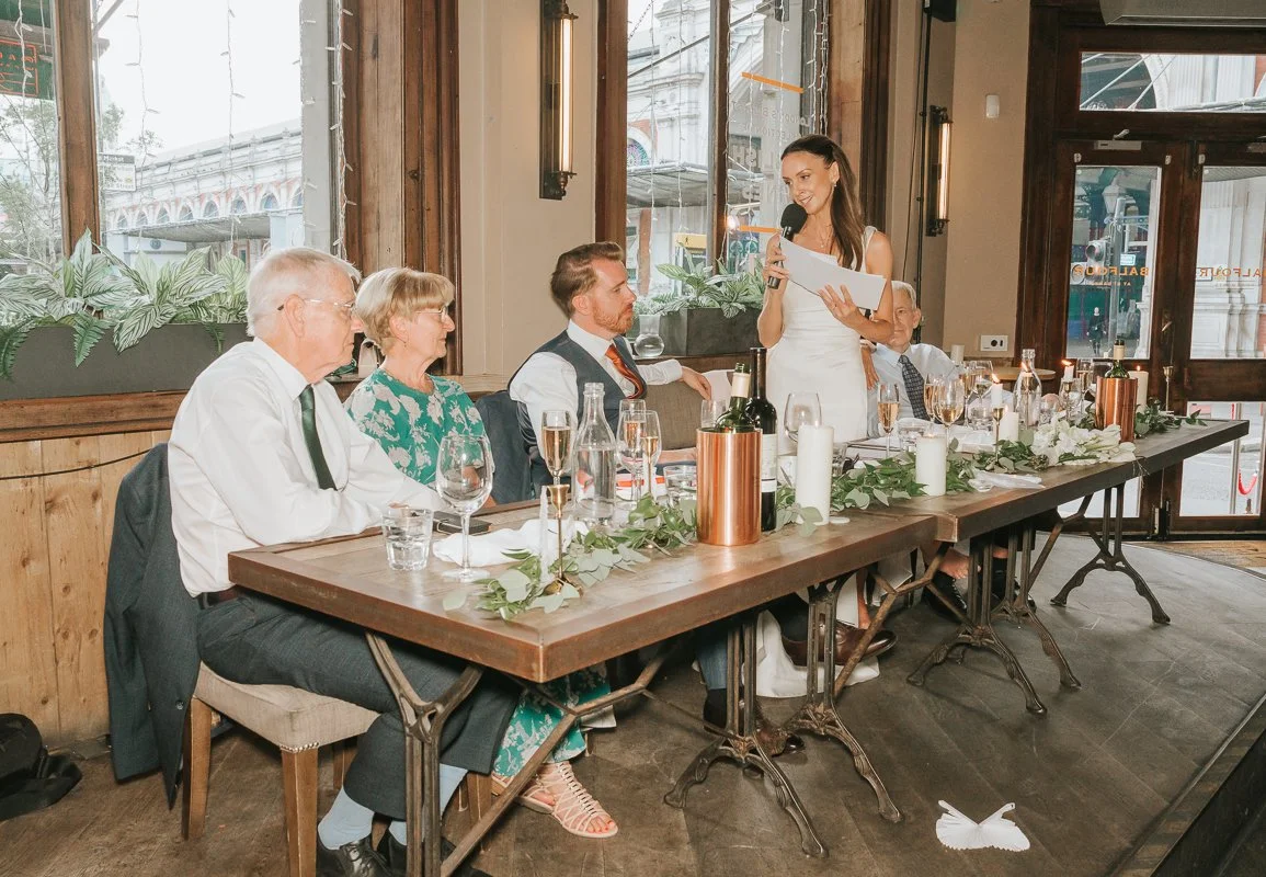  Bride giving a speech at the top table during her Balfour St Barts wedding reception. 