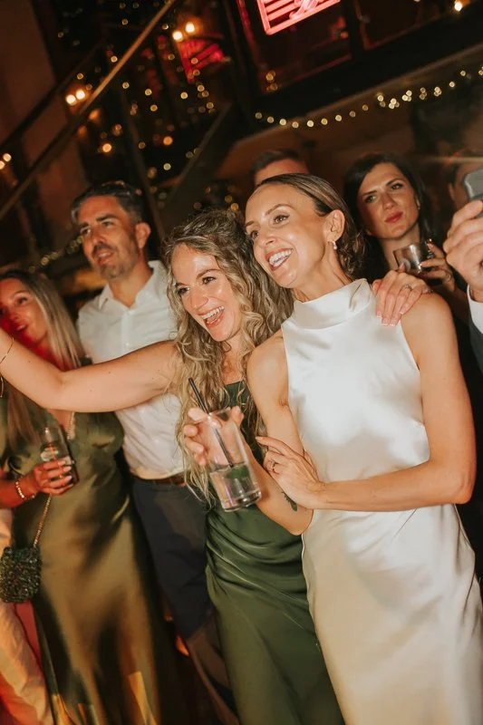   Bride and friends enjoying the dance floor at a lively Balfour St Barts wedding reception.  