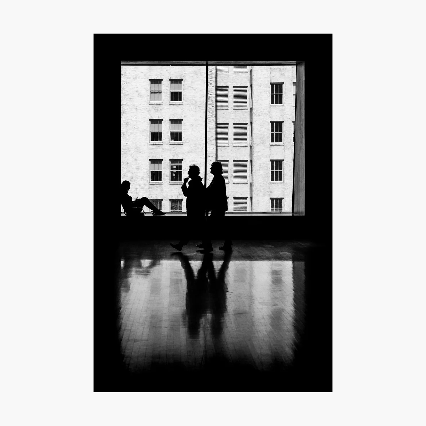 @harrywedmonds San Francisco, California, USA September 2017 My creative background is in the London design and advertising industry, where I also work as a design and art director. The graphic motifs in my photography are no doubt a direct result of my experience; I’m often drawn to silhouettes, shadows, and and striking architectural spaces. I took this photograph in an art gallery in San Francisco, where the vast windows became a canvas upon which to capture passing visitors. Photographed with the FujiFilm X-T2 and XF56 F1.2 .