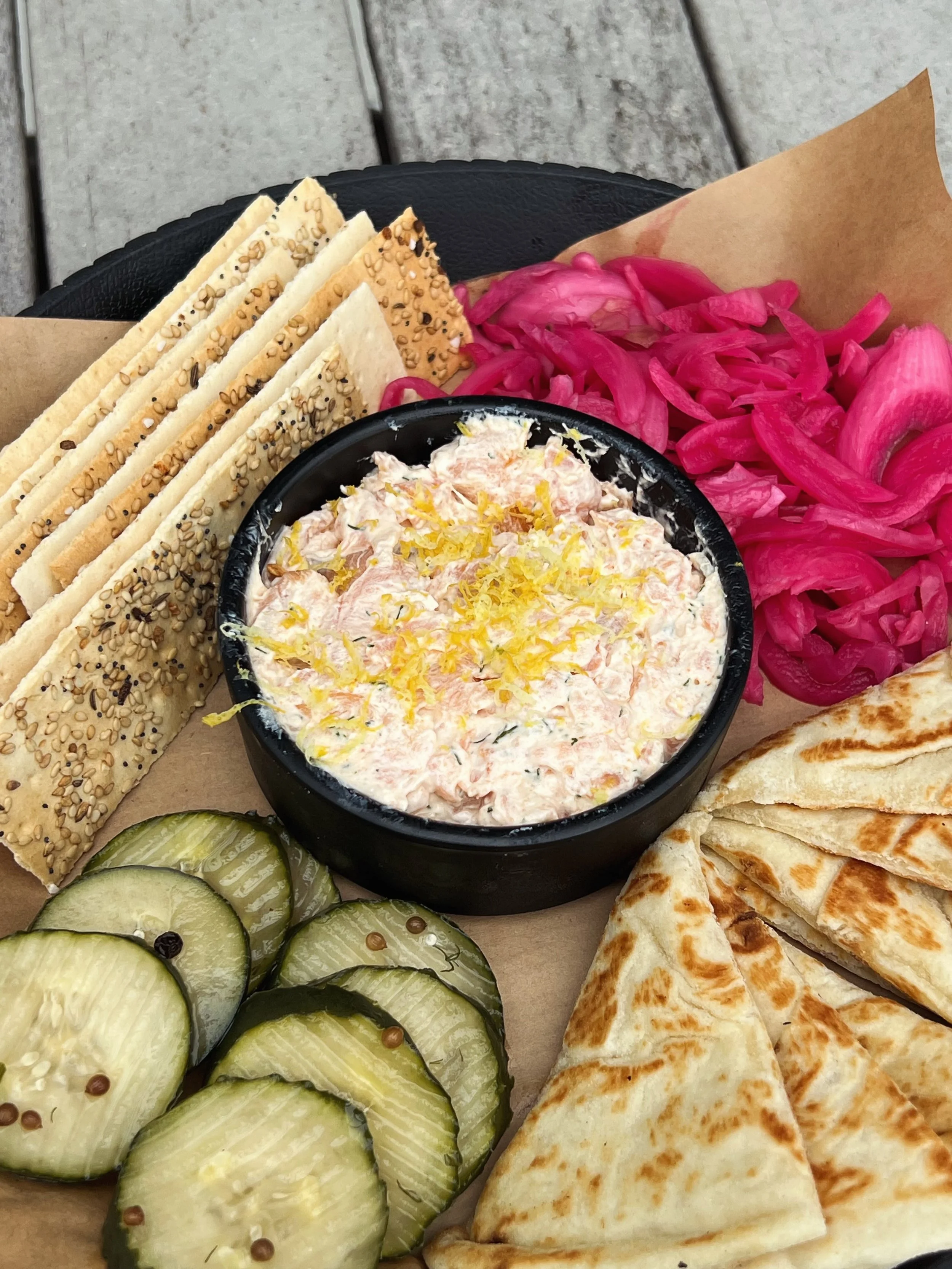 Smoked Salmon Dip! This sharable is new to our fall/winter menu! House-made smoked salmon dip served with warm naan, house-made pickles, garlic flatbread crackers, and pickled onions and cabbage!

#alexandriamn #brewpub #brewery #craftbeer #downtowna
