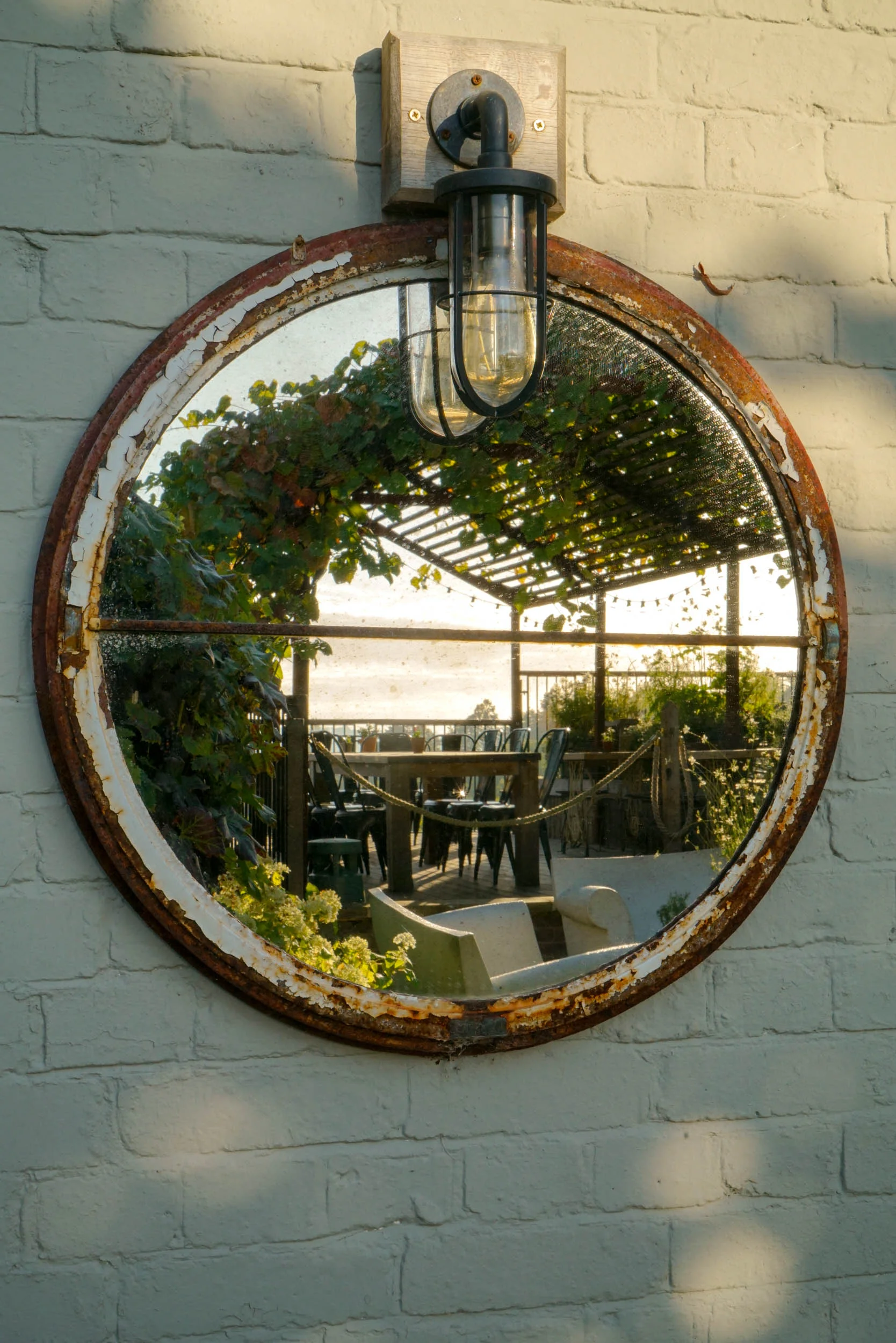 A vintage, antique mirror on the wall at The Beacon, Tunbridge Wells, Kent.