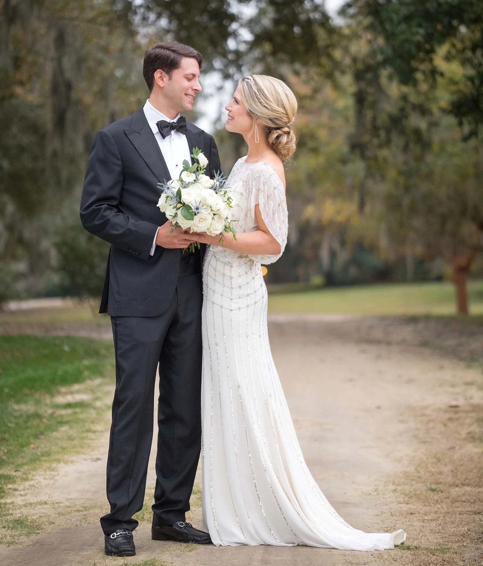 A bride and groom looking at each other at Yeamns Hall.