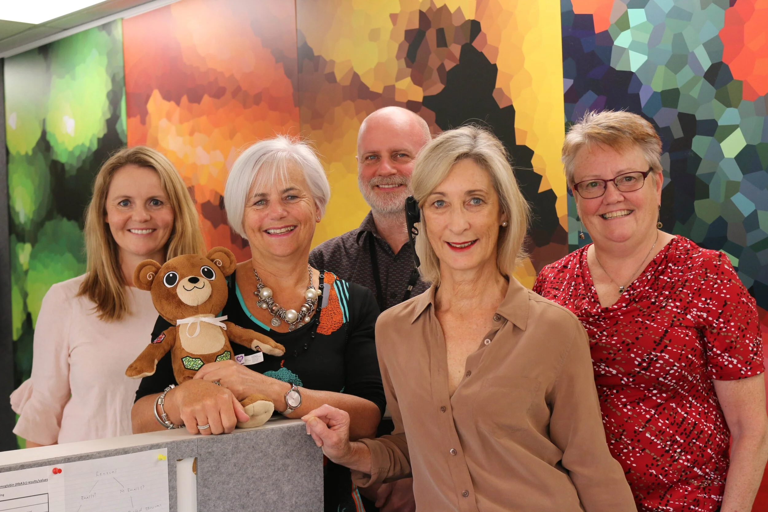 Some of the team at the Diabetes NZ office: (from left) Marsha Mackie, Heather Verry with Jerry the Bear, Stephen Jarvis, Nicky Steel and Liz Dutton