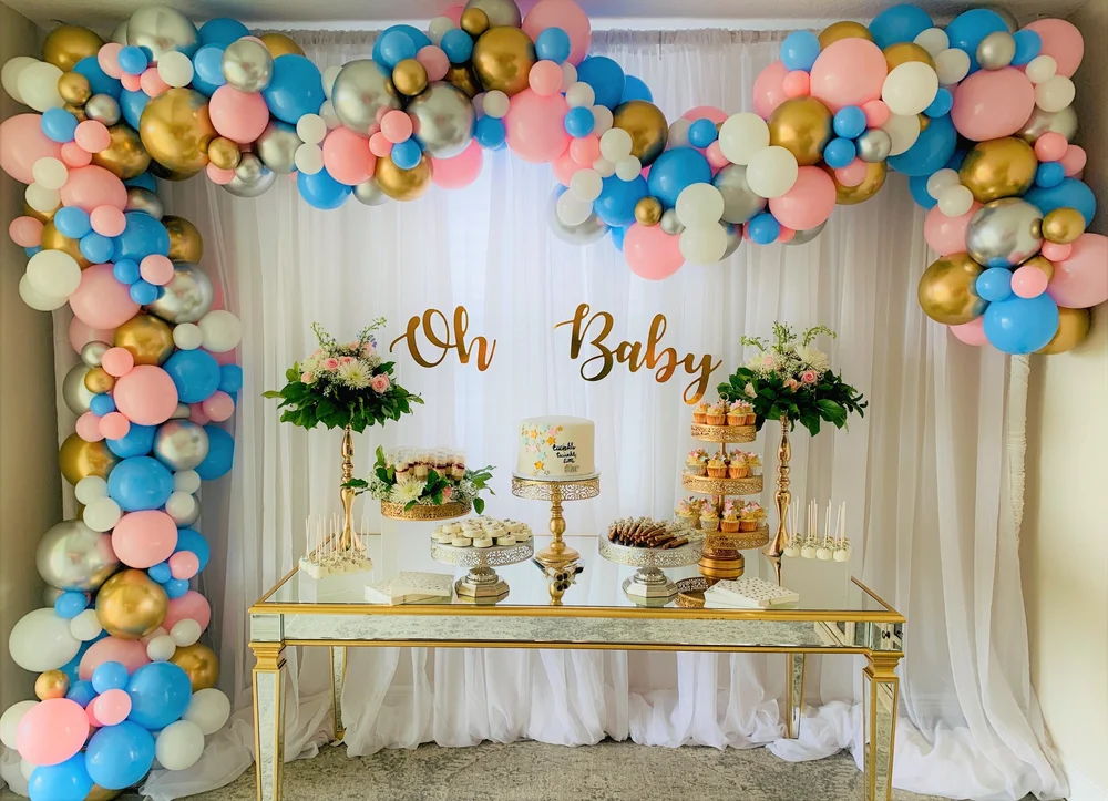 pink and white balloon arch