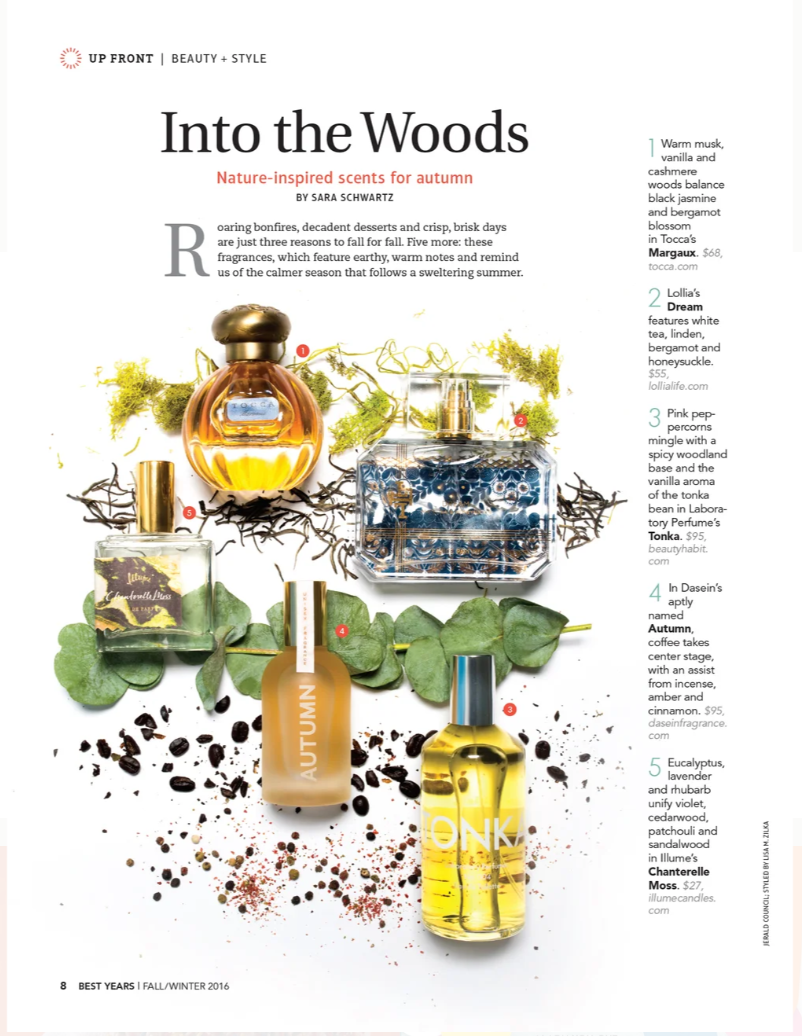 Beauty magazine page featuring five autumn-inspired perfumes surrounded by fall leaves, greenery, and spices, with descriptions and prices on the right.