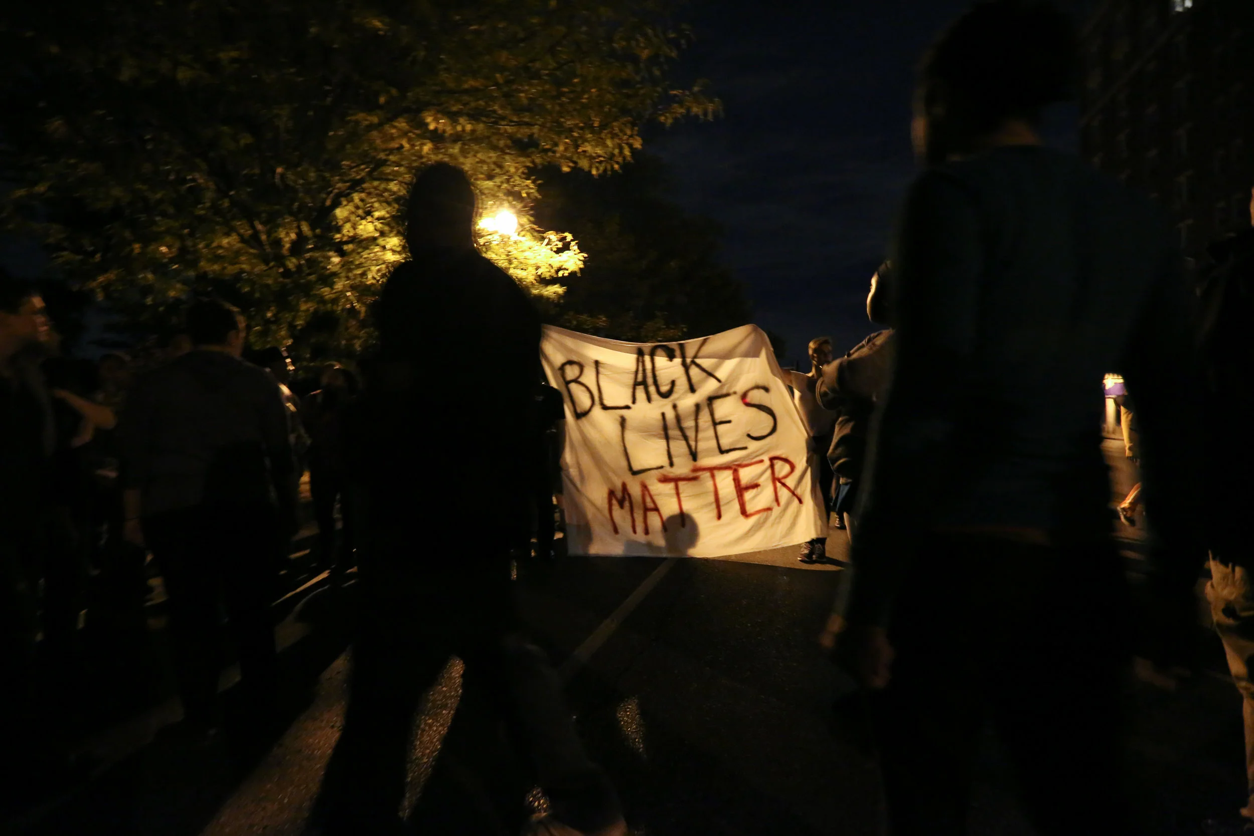 Nighttime marches swell beyond the confines of West Florissant in Ferguson, MO, in response to the killing of Vonderrit Myers Jr., repeatedly shutting down Shaw avenue.