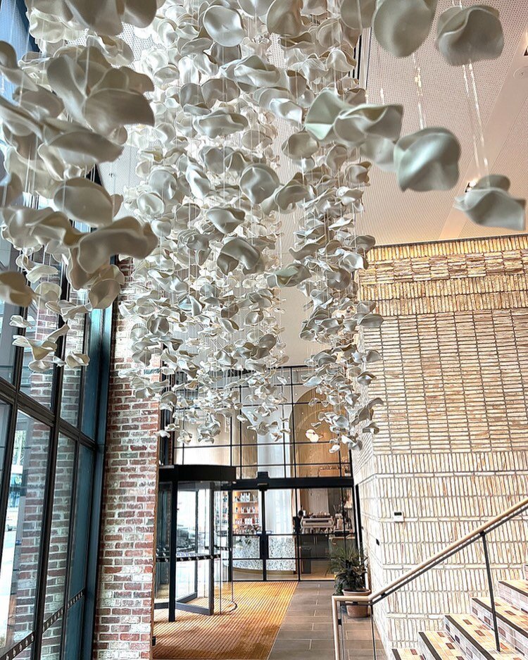 _
Commissioned for Home&rsquo;s Southbank lobby, &lsquo;Float&rsquo; is made from 10,000 hand formed paper-thin porcelain pieces, allowing light to pass through at different times of day, casting a myriad of tones and shadows.⁣
⁣
Architecture and Dev