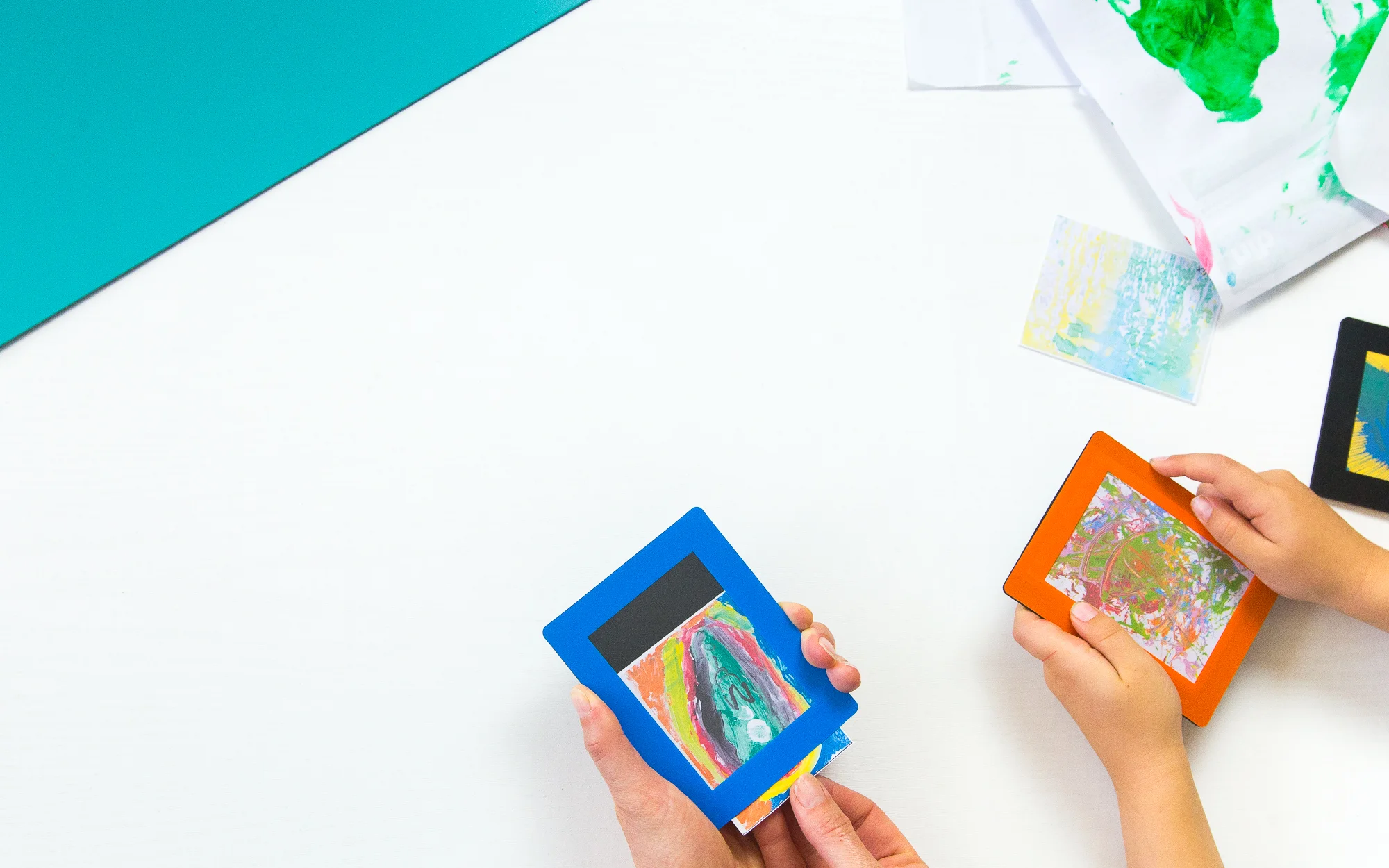  Inserting artwork into magnetic frames. Shot for Frame On  by Emma Baker Photography 