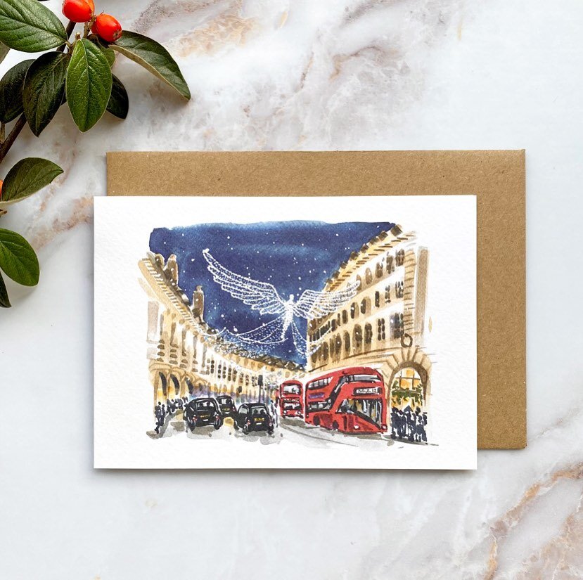 Christmas card packs are available on my shop now ✨ Two new designs based on beautiful London during the festive season. 
✨ 
This one features Regent Street with it&rsquo;s twinkling angels floating over shoppers in the falling snow. 
✨ 
Available in